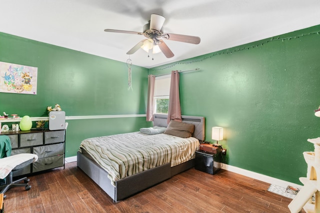 245 Country Hills Rd, Branson, MO 65616 - bedroom with wood finished floors, baseboards, and a ceiling fan