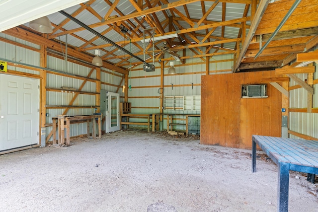 245 Country Hills Rd, Branson, MO 65616 - garage featuring metal wall and a garage door opener