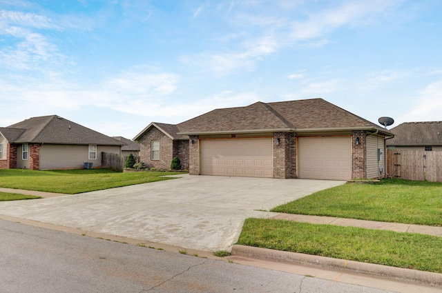 ranch-style house featuring a garage, brick siding, driveway, and a shingled roof