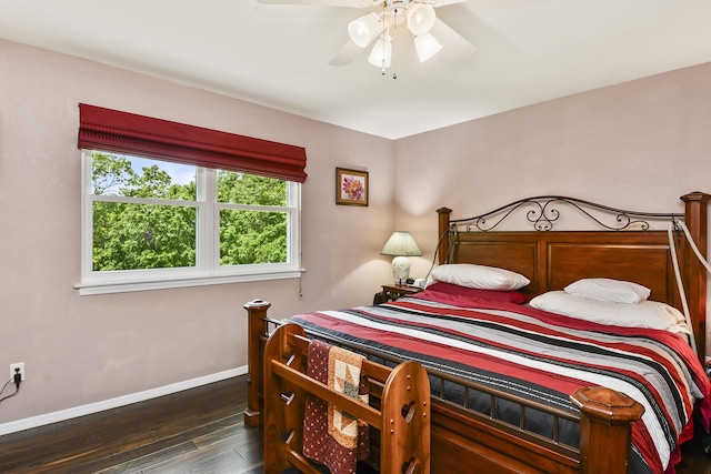 138 Canyon Forest Cir, Kimberling City, MO 65686 - bedroom featuring hardwood / wood-style floors, baseboards, and a ceiling fan