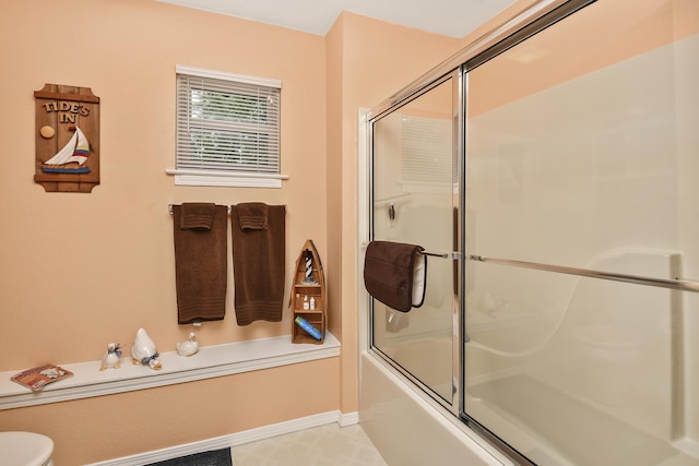 138 Canyon Forest Cir, Kimberling City, MO 65686 - bathroom featuring shower / bath combination with glass door and toilet