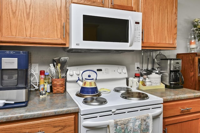 138 Canyon Forest Cir, Kimberling City, MO 65686 - kitchen featuring white appliances and brown cabinetry