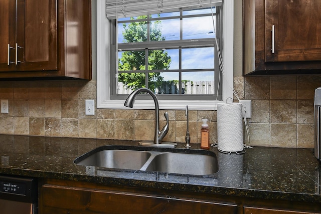 2107 S Gristmill Ct, Ozark, MO 65721 - kitchen featuring a sink, healthy amount of natural light, and dark brown cabinetry