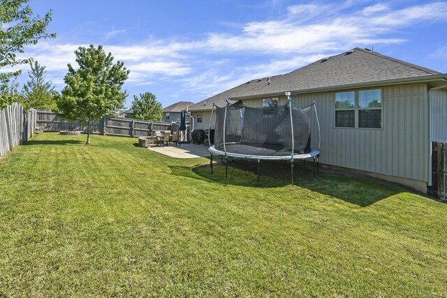 2107 S Gristmill Ct, Ozark, MO 65721 - view of yard with a trampoline and a patio area