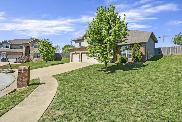 2107 S Gristmill Ct, Ozark, MO 65721 - view of front facade with a garage, brick siding, and driveway