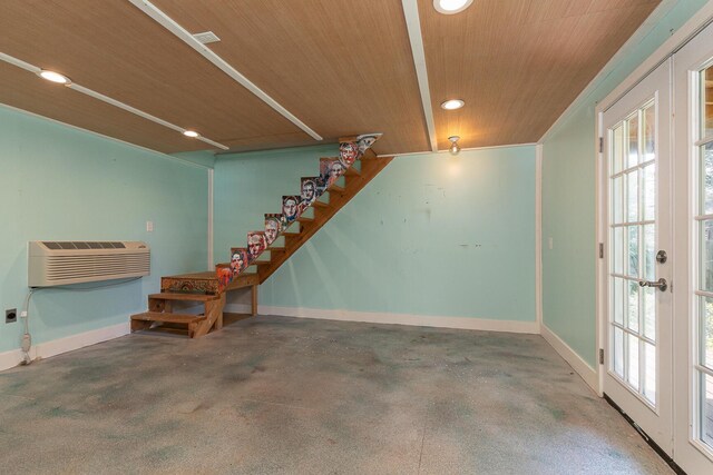 garage with french doors, wood ceiling, baseboards, recessed lighting, and heating unit