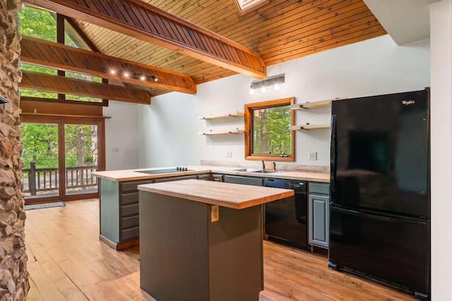 kitchen featuring black appliances, wood counters, open shelves, wood ceiling, and a center island