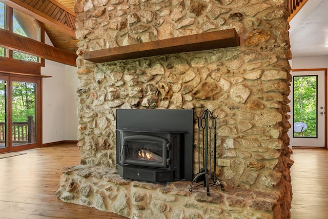 detailed view of wood finished floors, baseboards, and wood ceiling