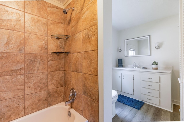 901 W Poplar St, Springfield, MO 65802 - bathroom with toilet, wood finished floors,  shower combination, and vanity