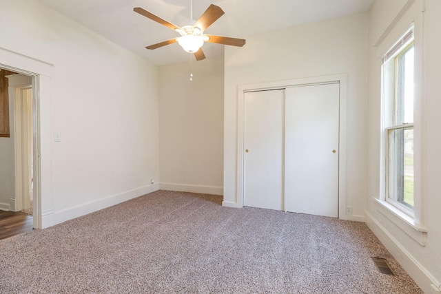 901 W Poplar St, Springfield, MO 65802 - unfurnished bedroom with carpet flooring, a closet, and baseboards