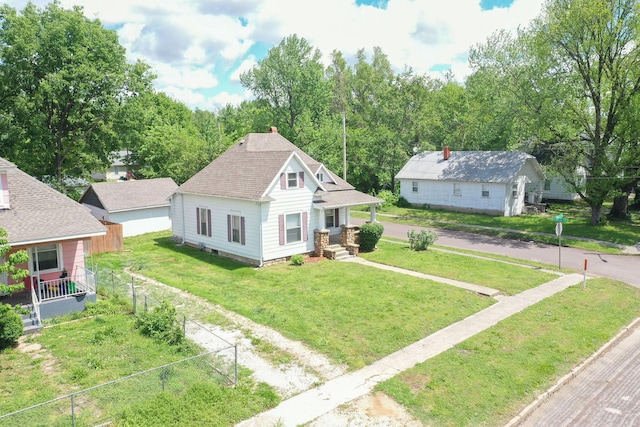 901 W Poplar St, Springfield, MO 65802 - view of front of home featuring a porch and a shingled roof