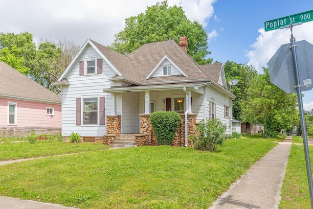 901 W Poplar St, Springfield, MO 65802 - view of front of property with covered porch, a chimney, and a shingled roof