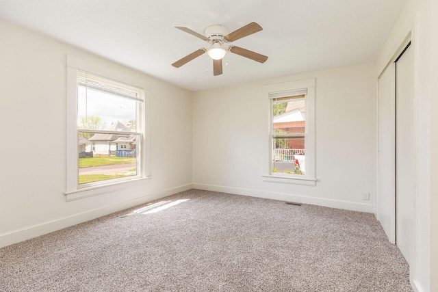 901 W Poplar St, Springfield, MO 65802 - unfurnished room with carpet, baseboards, and ceiling fan