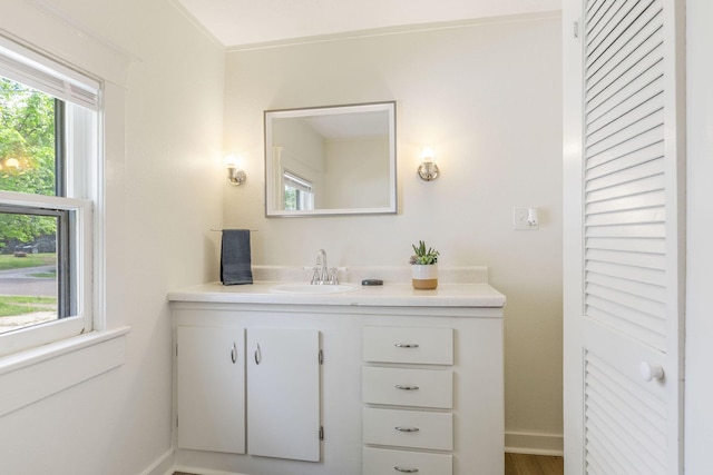 901 W Poplar St, Springfield, MO 65802 - bathroom with vanity and baseboards