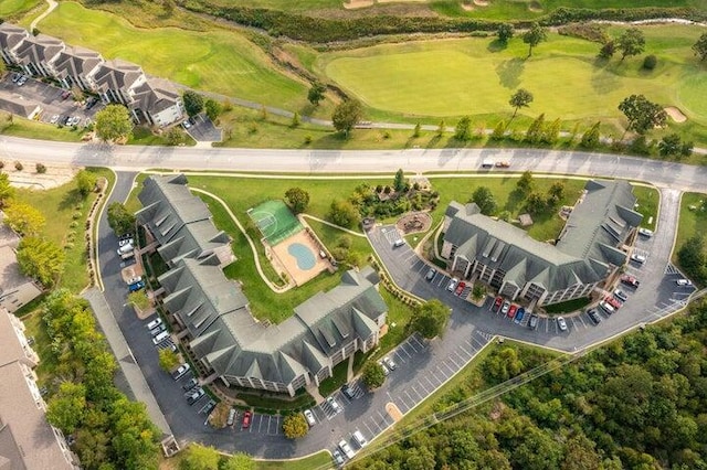 aerial overview of property's location featuring a local golf course