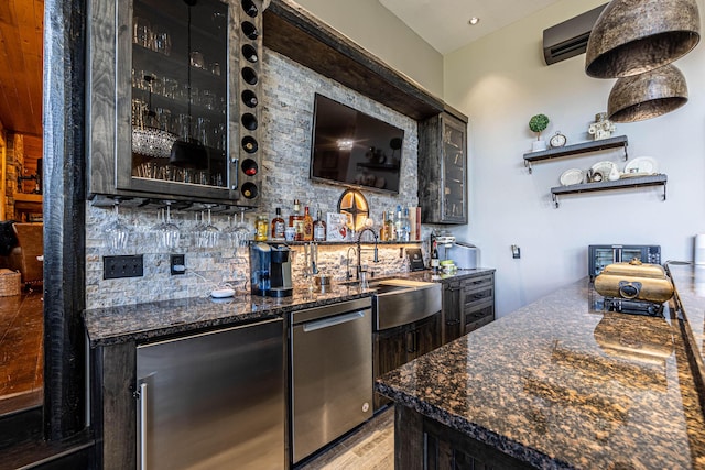 3701 S 1500th Rd, Rich Hill, MO 64779 - indoor wet bar featuring appliances with stainless steel finishes, decorative backsplash, a wall mounted AC, and light wood-type flooring
