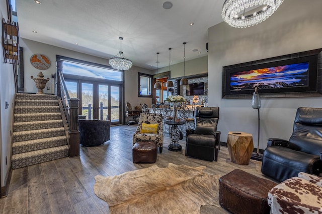 3701 S 1500th Rd, Rich Hill, MO 64779 - living room with a chandelier, wood-type flooring, stairway, recessed lighting, and french doors