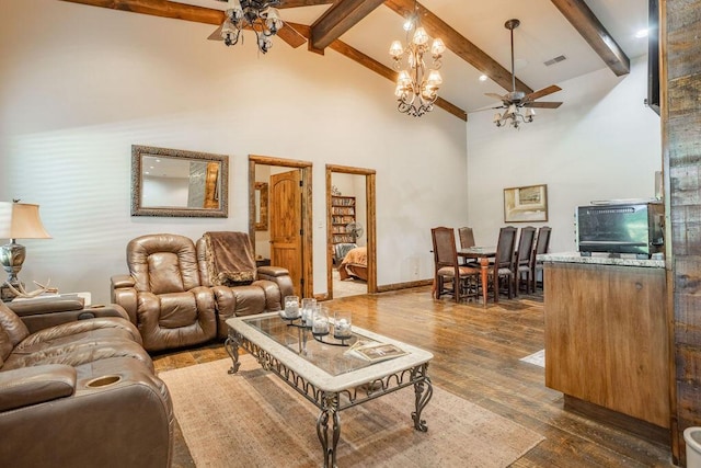 3701 S 1500th Rd, Rich Hill, MO 64779 - living area with a ceiling fan, beamed ceiling, high vaulted ceiling, dark wood-style floors, and a chandelier
