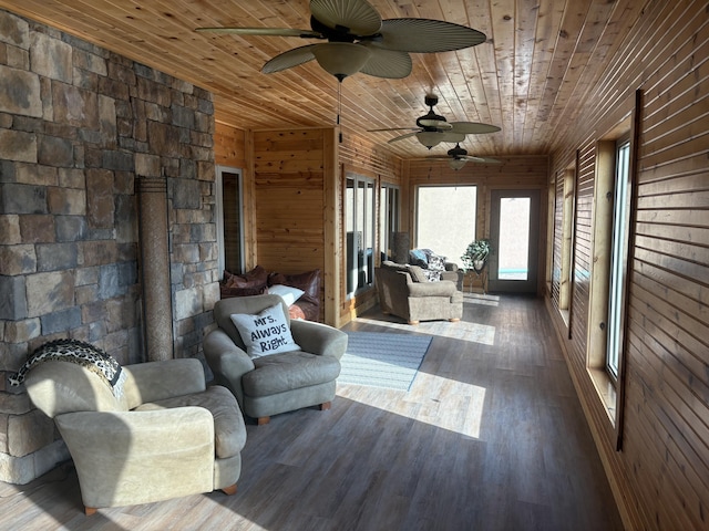 3701 S 1500th Rd, Rich Hill, MO 64779 - sunroom featuring wood ceiling, wood finished floors, and wood walls