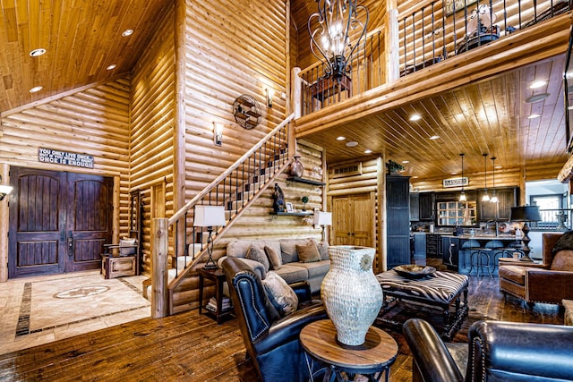 3701 S 1500th Rd, Rich Hill, MO 64779 - living area featuring a high ceiling, rustic walls, wooden ceiling, recessed lighting, and hardwood / wood-style flooring