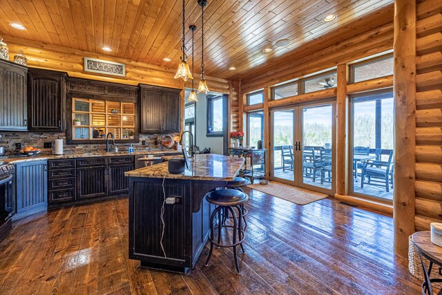 3701 S 1500th Rd, Rich Hill, MO 64779 - kitchen with recessed lighting, a sink, dark wood-style flooring, wooden ceiling, and french doors