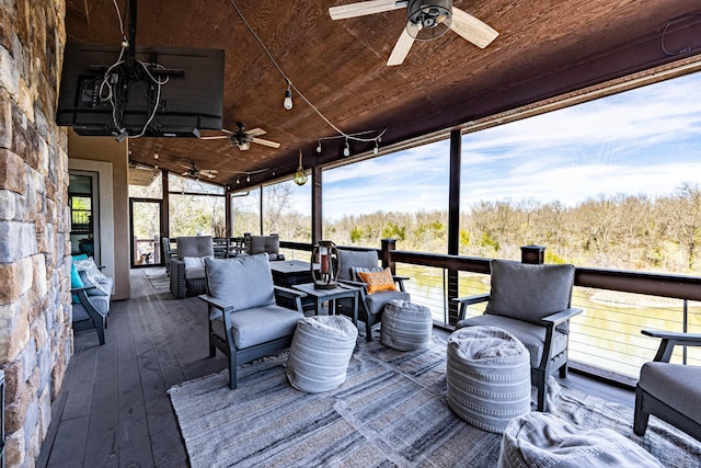 3701 S 1500th Rd, Rich Hill, MO 64779 - deck with a ceiling fan and an outdoor hangout area