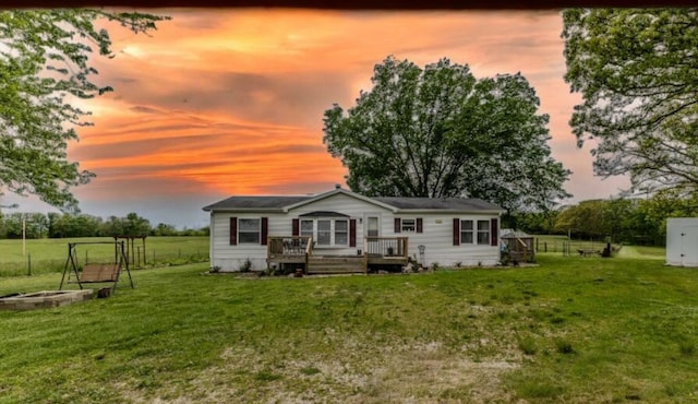 view of front of home with a deck