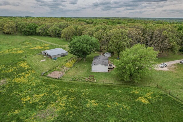 drone / aerial view of a heavily wooded area