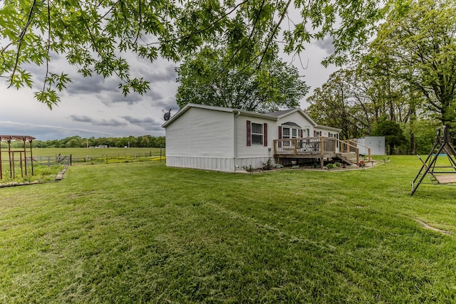 view of yard with a deck