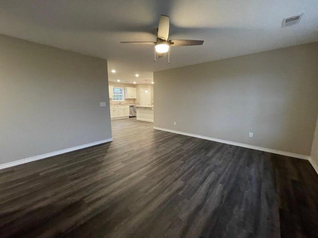 335 Mccann Rd, Powersite, MO 65731 - unfurnished living room with ceiling fan, baseboards, recessed lighting, and dark wood-type flooring