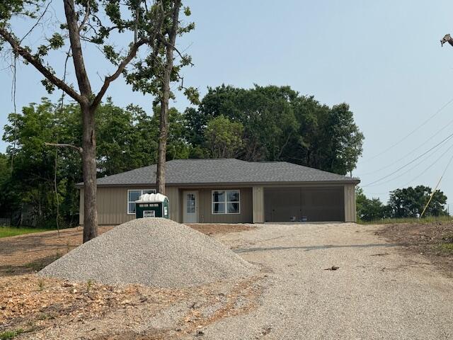 335 Mccann Rd, Powersite, MO 65731 - single story home with driveway and a garage
