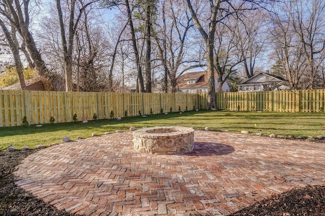 view of patio / terrace with an outdoor fire pit