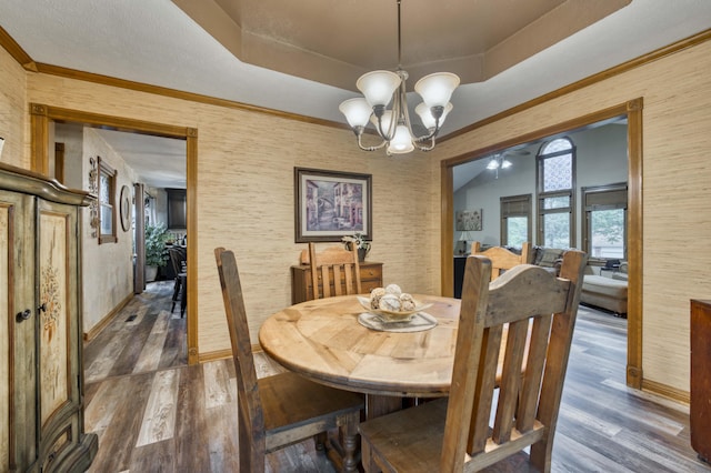 5425 S Westwood Ave, Springfield, MO 65810 - dining space featuring wood finished floors, a chandelier, and baseboards