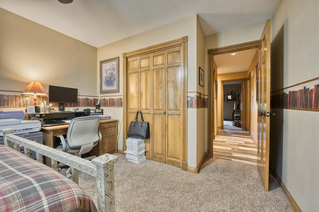 5425 S Westwood Ave, Springfield, MO 65810 - bedroom with light colored carpet, an office area, baseboards, and a closet