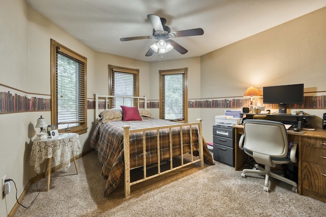 5425 S Westwood Ave, Springfield, MO 65810 - bedroom featuring light colored carpet, an office area, a ceiling fan, and baseboards