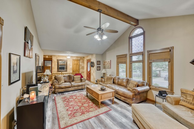 5425 S Westwood Ave, Springfield, MO 65810 - living area featuring wood finished floors, ceiling fan, beam ceiling, and high vaulted ceiling