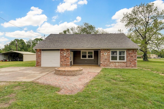 610 Chicago Ave, Marionville, MO 65705 - view of front facade with a detached carport, a front lawn, brick siding, and an attached garage