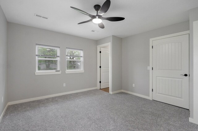 610 Chicago Ave, Marionville, MO 65705 - unfurnished bedroom with carpet floors, baseboards, and a ceiling fan