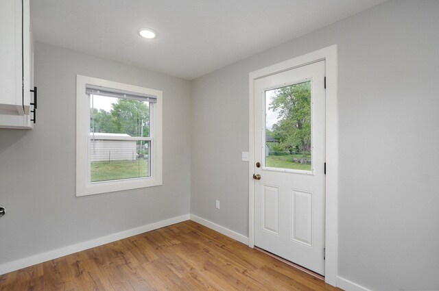 610 Chicago Ave, Marionville, MO 65705 - doorway with baseboards, light wood-style flooring, and recessed lighting