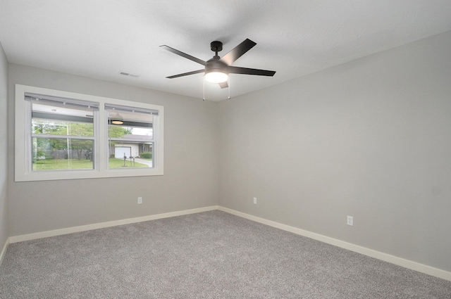 610 Chicago Ave, Marionville, MO 65705 - unfurnished room featuring ceiling fan, carpet, and baseboards