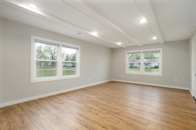 610 Chicago Ave, Marionville, MO 65705 - spare room with beamed ceiling, light wood-type flooring, baseboards, and recessed lighting