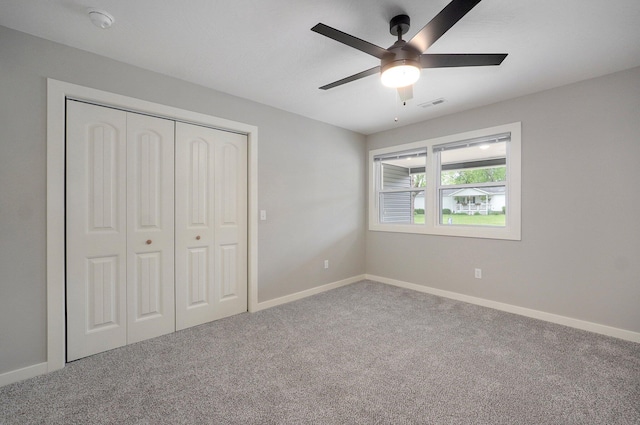 610 Chicago Ave, Marionville, MO 65705 - unfurnished bedroom with carpet floors, a closet, baseboards, and ceiling fan