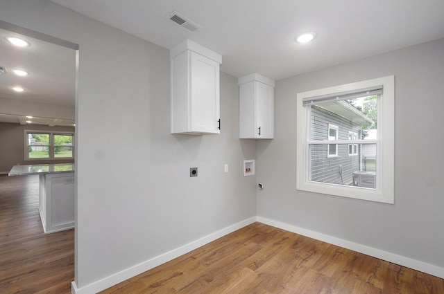 610 Chicago Ave, Marionville, MO 65705 - washroom with electric dryer hookup, hookup for a washing machine, wood finished floors, baseboards, and recessed lighting