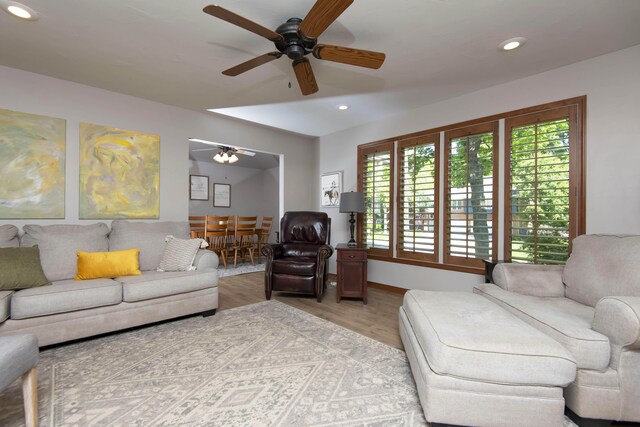 1918 E Buena Vista St, Springfield, MO 65804 - living room with a ceiling fan, light wood-style floors, and recessed lighting