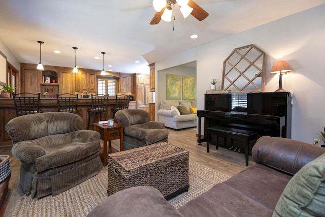 1918 E Buena Vista St, Springfield, MO 65804 - living area with light wood-style flooring, ceiling fan, recessed lighting, and decorative columns