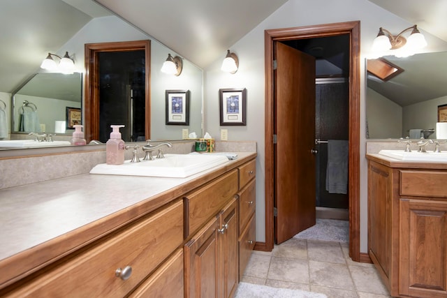 1918 E Buena Vista St, Springfield, MO 65804 - bathroom featuring lofted ceiling and two vanities
