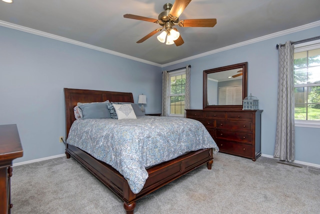 1918 E Buena Vista St, Springfield, MO 65804 - bedroom with light colored carpet, multiple windows, ornamental molding, baseboards, and ceiling fan