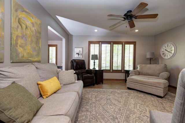 1918 E Buena Vista St, Springfield, MO 65804 - living room with light wood-type flooring, ceiling fan, recessed lighting, plenty of natural light, and baseboards