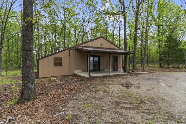 rear view of house with a patio area