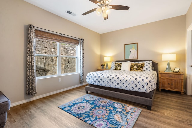 3112 S Vinyards Terrace Parkway Unit 4, Branson, MO 65616 - bedroom with wood finished floors, baseboards, and ceiling fan